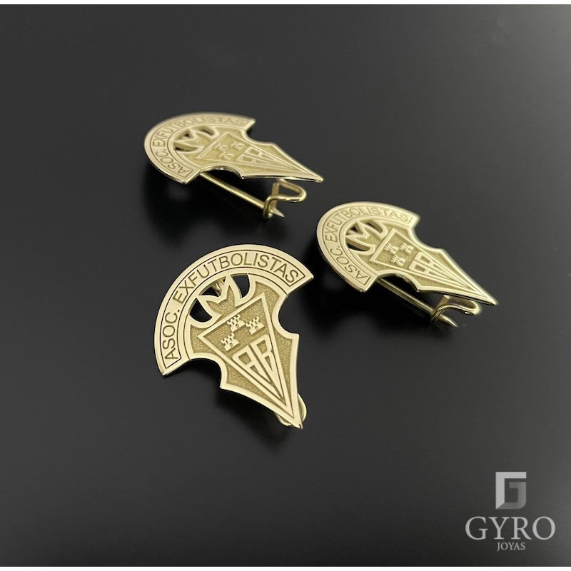Alfiler escudo oro